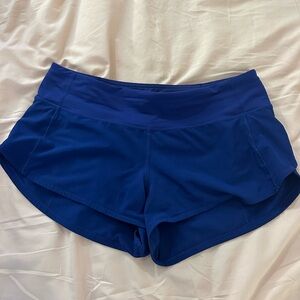 Lululemon 2.5 inch Blue Speed Ups! Size 6